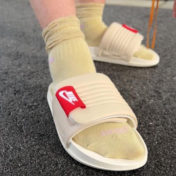 NIKE OFF COURT SLIDES